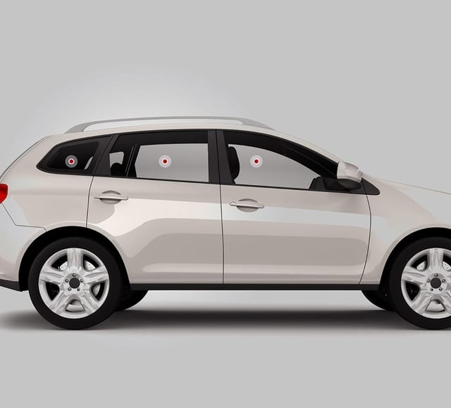 Side-view-of-a-car Side view of a car with dots on the windows