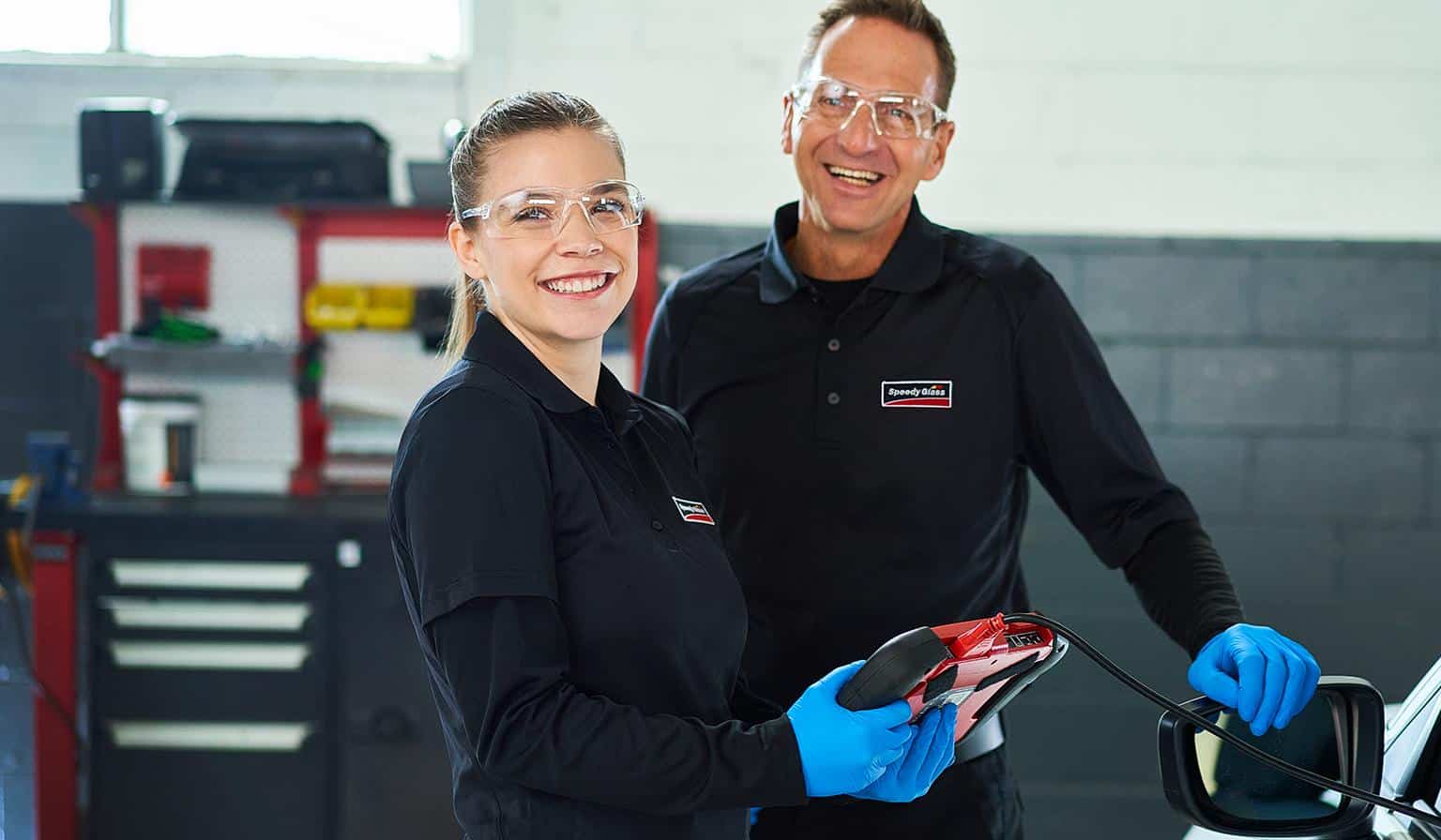 Des employés heureux chez Belron et Speedy Glass